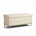Beige upholstered storage bench with tufted top and gold legs 100 x 40 x 45cm